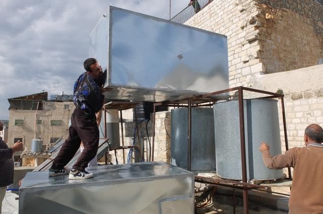 A water problem, and some concrete help in Bethlehem: new water tanks
